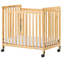 Foundations 1631040 SafetyCraft 24" x 38" Natural Compact Slatted Wood Crib with Fixed Sides, SafeSupport Adjustable Mattress Board, and 3" InfaPure Mattress