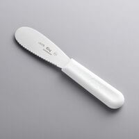 Choice 3 1/2 inch Scalloped Stainless Steel Sandwich Spreader with White Polypropylene Handle