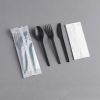 EcoChoice Wrapped Heavy Weight Compostable 6 1/2" Black CPLA Knife, Fork, Spoon, and Napkin - 250/Case