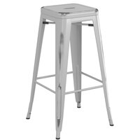 Lancaster Table & Seating Alloy Series Distressed Silver Stackable Metal Indoor / Outdoor Industrial Barstool with Drain Hole Seat