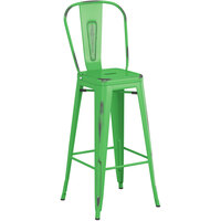 Lancaster Table & Seating Alloy Series Distressed Green Metal Indoor / Outdoor Industrial Cafe Barstool with Vertical Slat Back and Drain Hole Seat