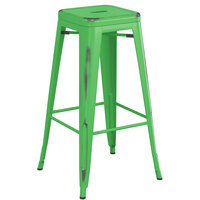 Lancaster Table & Seating Alloy Series Distressed Green Stackable Metal Indoor / Outdoor Industrial Barstool with Drain Hole Seat