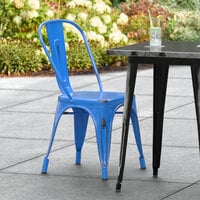 Lancaster Table & Seating Alloy Series Distressed Blue Metal Indoor / Outdoor Industrial Cafe Chair with Vertical Slat Back and Drain Hole Seat