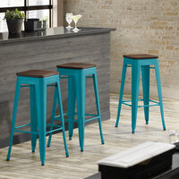 Lancaster Table & Seating Alloy Series Teal Metal Indoor Industrial Cafe Bar Height Stool with Walnut Wood Seat
