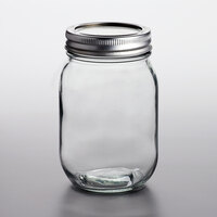 Choice 16 oz. Pint Regular Mouth Glass Canning / Mason Jar with Silver Metal Lid and Band - 12/Pack
