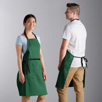 Choice Kelly Green Adjustable Bib Apron with 2 Pockets and Black Webbing Accents - 32 inch x 30 inch