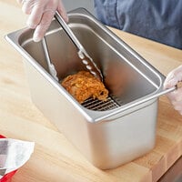 Choice 1/3 Size 6 inch Deep Anti-Jam Stainless Steel Steam Table / Hotel Pan with Footed Cooling Rack - 24 Gauge
