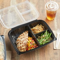 Choice 11 inch x 8 1/2 inch x 3 inch Microwaveable 3-Compartment Black / Clear Plastic Hinged Container - 100/Case