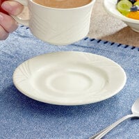 Acopa Swell 5 1/2 inch Ivory (American White) Embossed Stoneware Saucer - 36/Case