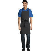 Uncommon Threads 3018 Black and White Pinstripe Customizable Poly-Cotton Butcher Bib Apron with 2 Pockets - 34 inchL x 23 inchW