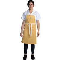 Uncommon Threads 3127 Egg Gold Customizable Poly-Cotton Avalanche Bib Apron with Natural Webbing and 3 Pockets - 34 inchL x 23 inchW