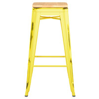 Lancaster Table & Seating Alloy Series Distressed Yellow Stackable Metal Indoor Industrial Barstool with Natural Wood Seat