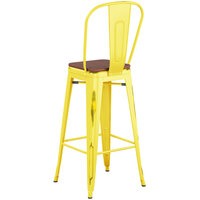 Lancaster Table & Seating Alloy Series Distressed Yellow Metal Indoor Industrial Cafe Bar Height Stool with Vertical Slat Back and Walnut Wood Seat
