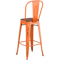Lancaster Table & Seating Alloy Series Distressed Orange Metal Indoor Industrial Cafe Bar Height Stool with Vertical Slat Back and Walnut Wood Seat