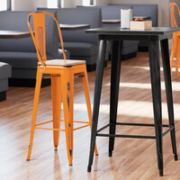 Lancaster Table & Seating Alloy Series Distressed Orange Metal Indoor Industrial Cafe Bar Height Stool with Vertical Slat Back and Natural Wood Seat