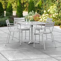 Lancaster Table & Seating 36 inch x 36 inch Silver Powder-Coated Aluminum Dining Height Outdoor Table with Umbrella Hole and 4 Arm Chairs