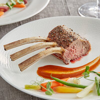 Strauss 18-20 oz. New Zealand Grass-Fed Frenched Lamb Rack - 16/Case