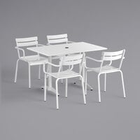 Lancaster Table & Seating 32" x 48" White Powder-Coated Aluminum Dining Height Outdoor Table with Umbrella Hole and 4 Arm Chairs