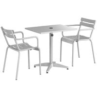 Lancaster Table & Seating 24 inch x 32 inch Silver Powder-Coated Aluminum Dining Height Outdoor Table with Umbrella Hole and 2 Arm Chairs