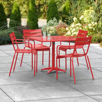 Lancaster Table & Seating 36 inch x 36 inch Red Powder-Coated Aluminum Dining Height Outdoor Table with Umbrella Hole and 4 Arm Chairs