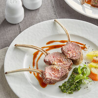 Strauss 20-22 oz. New Zealand Grass-Fed Frenched Lamb Rack - 16/Case