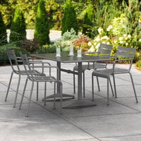 Lancaster Table & Seating 32 inch x 48 inch Matte Gray Powder-Coated Aluminum Dining Height Outdoor Table with Umbrella Hole and 4 Arm Chairs