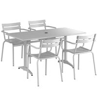 Lancaster Table & Seating 32 inch x 60 inch Silver Powder-Coated Aluminum Dining Height Outdoor Table with Umbrella Hole and 4 Arm Chairs