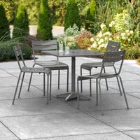 Lancaster Table & Seating 32 inch x 32 inch Matte Gray Powder-Coated Aluminum Dining Height Outdoor Table with Umbrella Hole and 4 Side Chairs