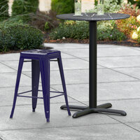 Lancaster Table & Seating Alloy Series Navy Stackable Metal Indoor / Outdoor Industrial Cafe Counter Height Stool with Drain Hole Seat