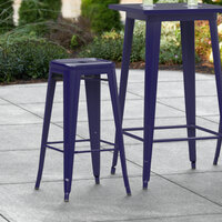 Lancaster Table & Seating Alloy Series Navy Stackable Metal Indoor / Outdoor Industrial Barstool with Drain Hole Seat