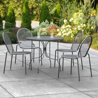 Lancaster Table & Seating Harbor Black 36 inch Round Dining Height Powder-Coated Steel Mesh Table with Ornate Legs and 4 Side Chairs
