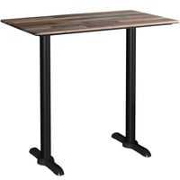 Lancaster Table & Seating Excalibur 27 1/2" x 47 3/16" Rectangular Bar Height Table with Textured Mixed Plank Finish and Two End Outdoor Base Plates
