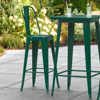 Lancaster Table & Seating Alloy Series Emerald Metal Indoor / Outdoor Industrial Cafe Barstool with Vertical Slat Back and Drain Hole Seat