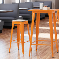 Lancaster Table & Seating Alloy Series Orange Stackable Metal Indoor Industrial Barstool with Gray Wood Seat