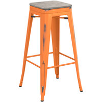 Lancaster Table & Seating Alloy Series Distressed Orange Stackable Metal Indoor Industrial Barstool with Gray Wood Seat