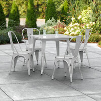 Lancaster Table & Seating Alloy Series 32 inch x 32 inch Distressed Silver Dining Height Outdoor Table with 4 Industrial Cafe Chairs