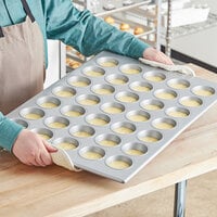 Wilton 191002921 Perfect Results 6 Cup 7.1 oz. Non-Stick Steel Jumbo Muffin  / Cupcake Pan - 8 5/8 x 13 1/4