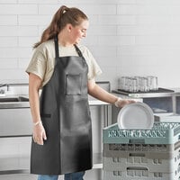 Choice Black 38 Mil Heavy Weight Vinyl Adjustable Dishwasher Apron with Pocket - 32 inch x 26 inch