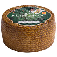 Don Juan 4-Month Aged Queso Manchego DOP Cheese 7 lb. Wheel - 2/Case