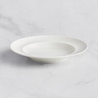 RAK Porcelain Bouquet 9 7/16 inch Ivory Embossed Wide Rim Porcelain Deep Plate - 12/Case
