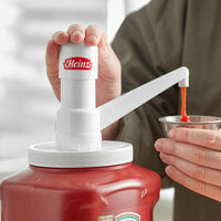 Heinz 1 oz. Fixed Nozzle Plastic Condiment Pump with Dip Tube for #10 Jugs