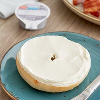 Philadelphia Reduced Fat Cream Cheese Spread Portion Cup 0.75 oz. - 100/Case
