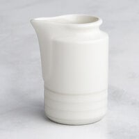 RAK Porcelain Rondo 2.5 oz. Ivory Embossed Porcelain Creamer - 24/Case
