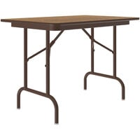 Correll 24 inch x 36 inch Medium Oak Keyboard Height Thermal-Fused Laminate Top Folding Table with Brown Frame and Leveling Feet