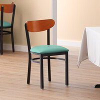 Lancaster Table & Seating Boomerang Black Finish Chair with 2 1/2 inch Seafoam Vinyl Padded Seat and Cherry Wood Back