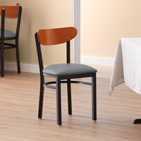 Lancaster Table & Seating Boomerang Black Finish Chair with 2 1/2 inch Dark Gray Vinyl Padded Seat and Cherry Wood Back