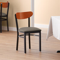 Lancaster Table & Seating Boomerang Black Finish Chair with 2 1/2 inch Taupe Vinyl Padded Seat and Cherry Wood Back