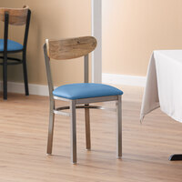 Lancaster Table & Seating Boomerang Clear Coat Finish Chair with 2 1/2 inch Blue Vinyl Padded Seat and Driftwood Back