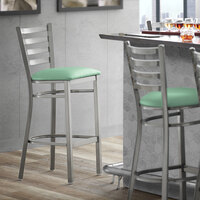 Lancaster Table & Seating Clear Coat Ladder Back Bar Height Chair with Seafoam Padded Seat - Detached Seat