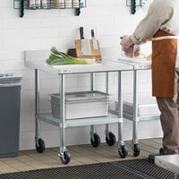 Regency 30 inch x 30 inch 18-Gauge 304 Stainless Steel Commercial Work Table with 4 inch Backsplash, Galvanized Legs, Undershelf, and Casters